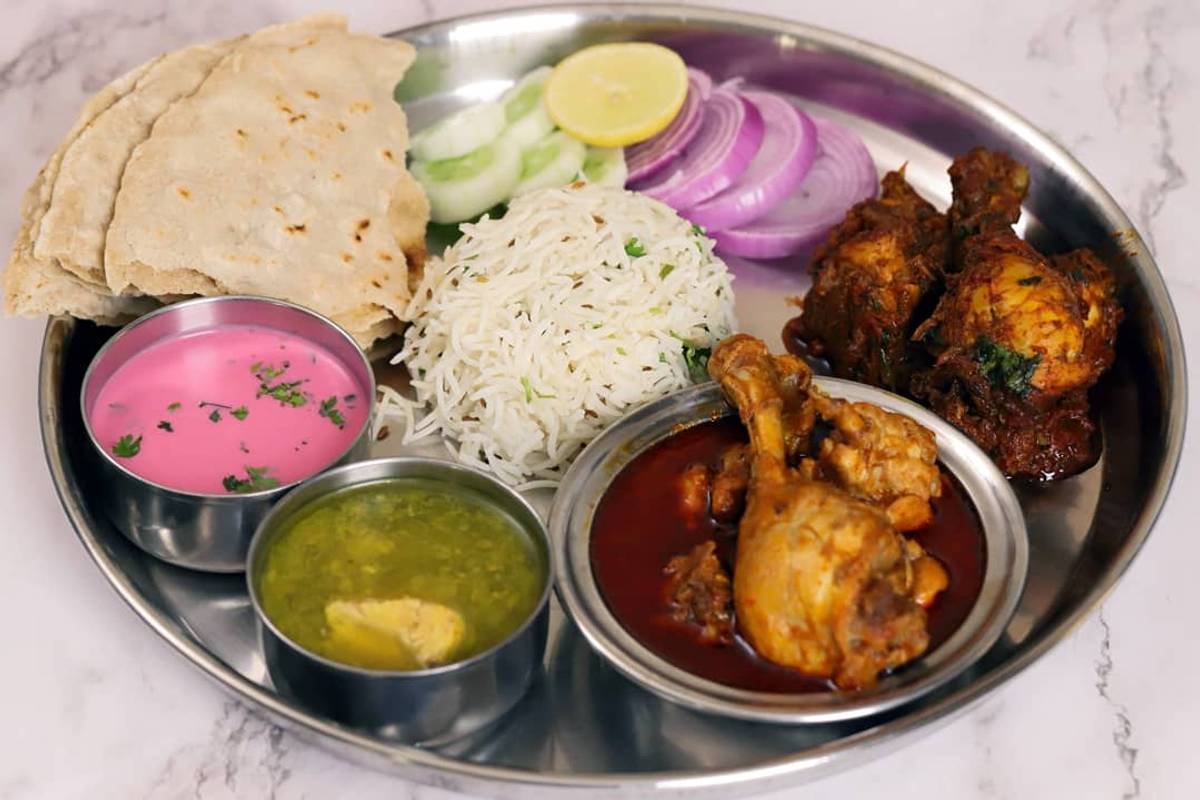 Chicken thali photographed on Kartik Bhojanalay’s Swiggy listing